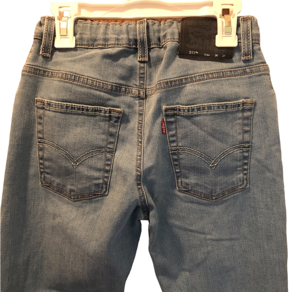 Levi’s 511 boys size 12, slim fit, worn once, good condition. Adjustable waist
